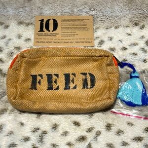 FEED Project makeup bag with tassel zipper